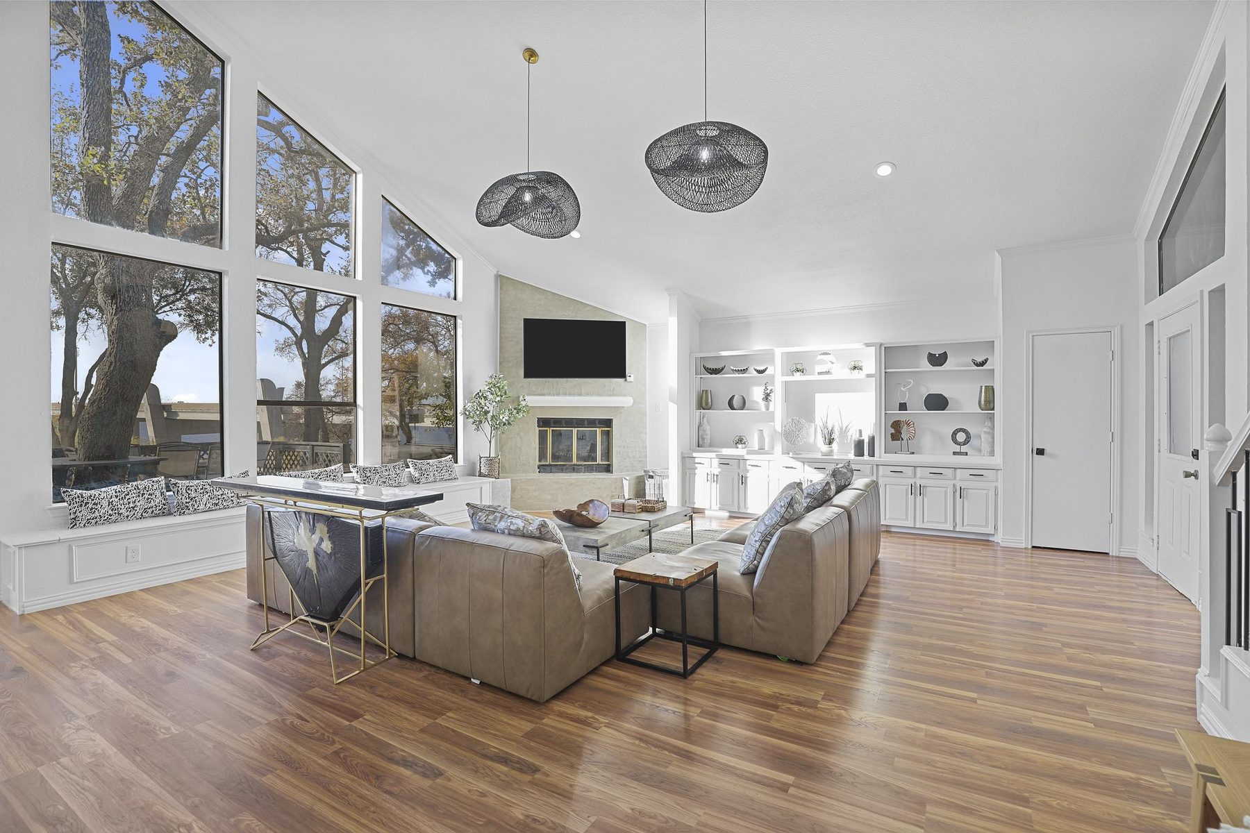 Vaulted great room with fireplace and built-ins